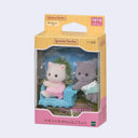 Sylvanian Families cat figures in a car with packaging on a white background