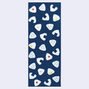 Rectangular tea towel, navy blue, with a repeating pattern of onigiri rice balls with different flavors.