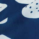 Close-up of blue fabric with white onigiri patterns