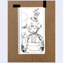 A black ink illustration on a white sheet of paper, taped to a brown kraft paper background. The drawing shows a stylized character in futuristic armor with mechanical details.