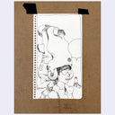 A hand-drawn black ink illustration on a white sheet of paper, taped to a brown kraft card background. The sketch shows a stylized figure wearing a large blob shaped hat, with a bird's beak poking out the top, with doodled speech bubbles and abstract details.