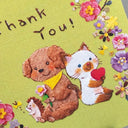 Children's card with a dog, cat, and hedgehog holding flowers and a heart on a green background.