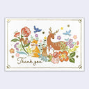 Greeting card with a pretty illustration of several forest animals sitting amongst florals.