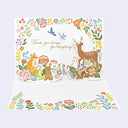 Open view of a 3D pop-up greeting card, with flowers and forest animals along with text that reads "thank you always for everything"