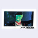 Colorful drawing of a character with a black hat and green face on a white background