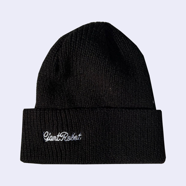 Black beanie with 'Giant Robot' embroidery on a light gray background