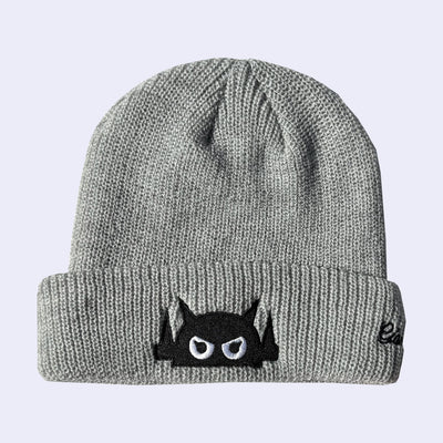 Gray beanie with a black and white face Big Boss Robot design on a light gray background