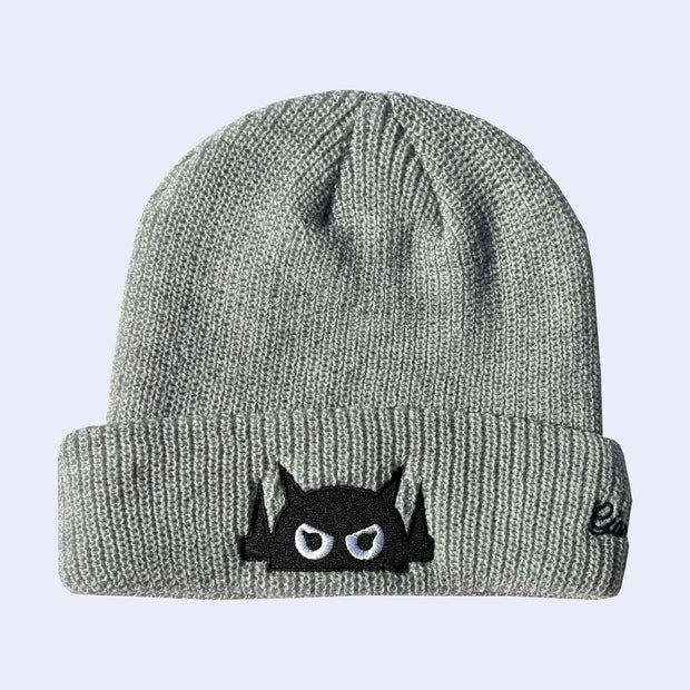 Gray beanie with a black and white face Big Boss Robot design on a light gray background