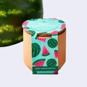 Seed sprouting kit for baby watermelon with a watermelon in the background