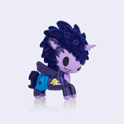 "Wolfie" unicorn figure, mostly purple with a flocked dark purple mane, wild with lots of hair. Its face and body is shaped like a unicorn but resembles a werewolf, with ripped jeans, fangs, and hair on its chest.