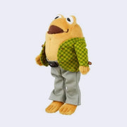 Plush doll of Toad from Frog and Toad, wearing a checkered jacket with sewn on beads as buttons, gray trousers and a pleather belt.