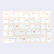 Sheet of white cartoon chibi Totoro characters with orange accents on a beige background