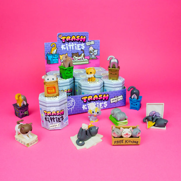 12 different designs of small vinyl figurines of Trash Kitties, cats engaging in alley cat behavior. Full options are in description.