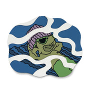 Semi 3D illustration on panel of a cartoon person, wearing a pink beanie and green sunglasses. He is shirtless and wears green swim trunks and lounges on a floaty. The piece has an underwater effect with coloring and white water shapes.