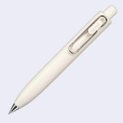 Thick, short off white colored pen with a side clip and a silver pen opening.