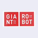 White outlined rectangular sticker with 2 red squares next to one another. One square reads "Giant" in large font with accompanied kanji. Other box reads "Robot" in large font accompanied by kanji.