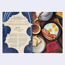 Breakfast spread with eggs, bacon, and toast on a wooden table, featuring a recipe card on the left.