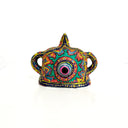 Colorful decorative sculpture with intricate patterns on a white background