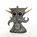 Black and white abstract sculpture with intricate patterns on a white background