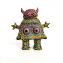 Colorful decorative figurine with intricate patterns on a white background