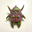 Colorful mask with intricate designs on a white background