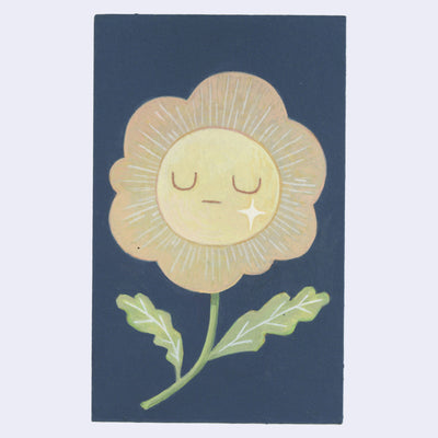 Floral design with a face on a dark blue background