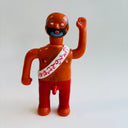 Toy figure with a sash and raised arm on a white background