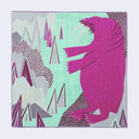 Tea towel with mint green and bright pink coloring with an illustration of a walrus amongst pointed mountains.