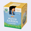 Water Garden with Cat growing kit in its original yellow and blue packaging, featuring a cat peeking out from the box. Inside is a glass bowl to grow an aquascape in.