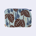 Fabric pouch with leaf pattern on a light blue background