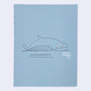 Illustration on blue paper of a whale laying with a worried expression.