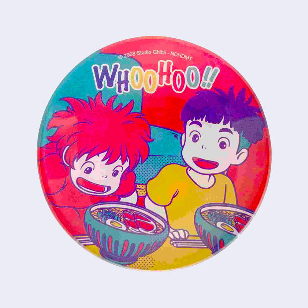 Rounded glass plate featuring brightly colored illustration from Ponyo, of 2 young kids excitedly looking at bowls of ramen. "Whoohoo!" is written stylistically on the plate.