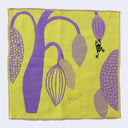 Light yellowish green square handkerchief featuring stylistic illustrations of a purple plant, with a very thick trunk and bulb shaped blooms. A small black frog jumps onto one of the blooms.