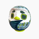 Colorful rounded owl figurine on a white background