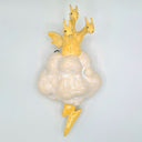 A ceramic wall-mounted sculpture of three small yellow dragons riding a white cloud with a yellow lightning bolt at the base, set against a plain light gray background.