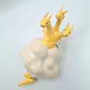 A ceramic wall-mounted sculpture of three small yellow dragons riding a white cloud with a yellow lightning bolt at the base, set against a plain light gray background.