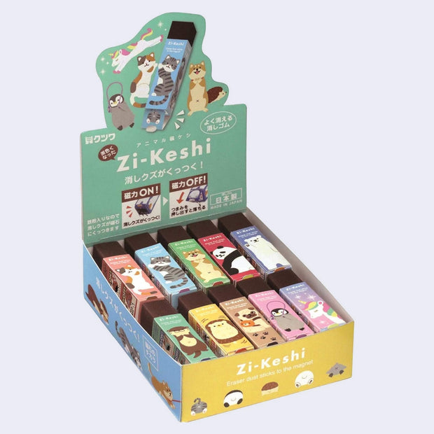 Set of 10 rectangular black erasers, each with their own sleeve design featuring a cute animal and a different colored sleeve. Options are: unicorn, calico cat, gray tabby cat, shiba inu, panda, polar bear, otter, hedgehog, pug, and penguin. In their product packaging.