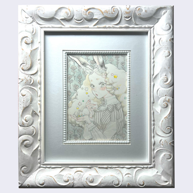 Pen and watercolor drawing of a cute and nervous looking woman with bunny ears in a decorative collared dress, looking to the side. Around her head is a fluffy halo of clouds, she holds small colorful stars in the palm of her hand. Piece is in a very ornate white wooden frame.