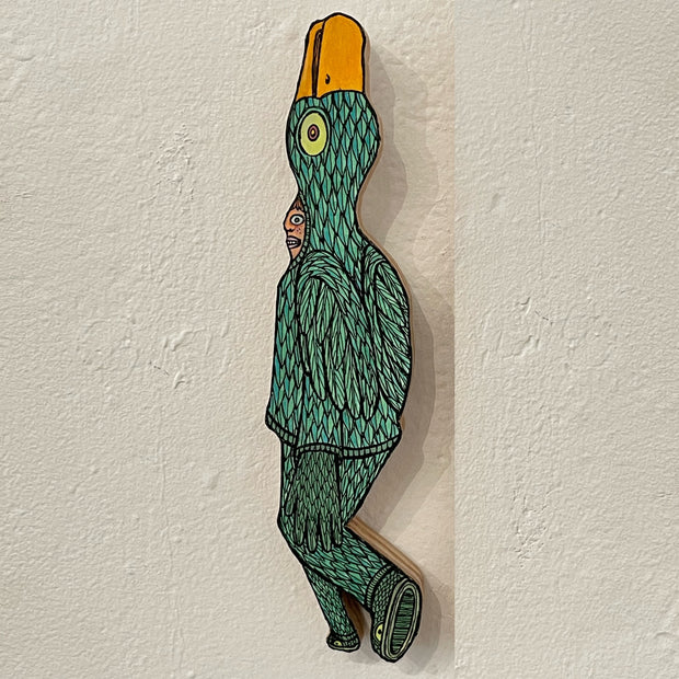 Illustrated wood cut of a human inside of a large blue green duck costume. They are positioned as if walking away from viewer. 