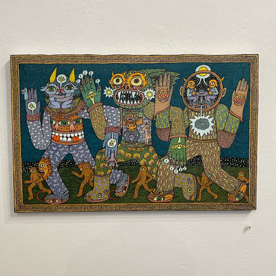 Illustration on wood of 3 large monsters linking arms and walking, they have very detailed scenes within their faces and all wear sweaters and pants decorated with intricate patterns. Smaller cyclopses walk around their feet.