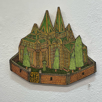 Illustrated wood cut of an elaborate gothic style house enclosed in a brick wall. 4 skinny pine trees with eyes stand in the yard. A cloaked green goblin with a pointy hat stands near the door.