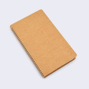 Kraft paper blank cover notebook with rounded corners and metal spiral binding on side.