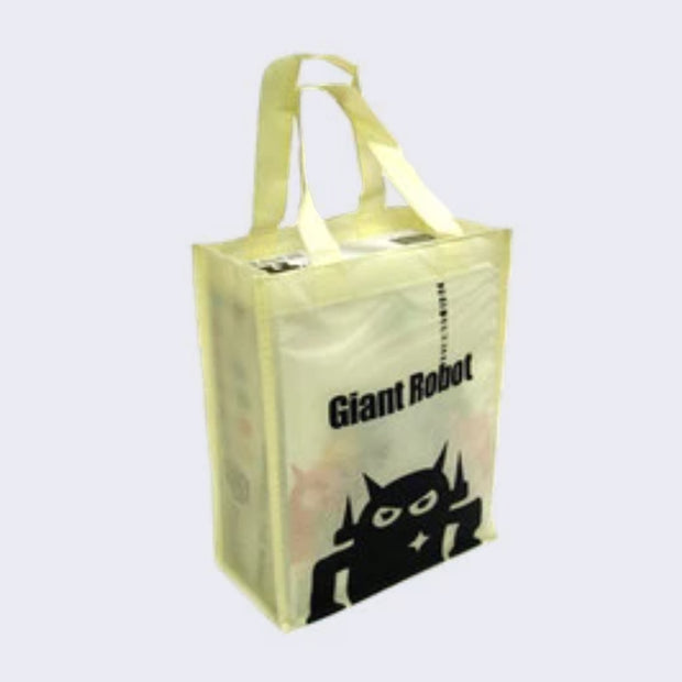 A box of blindboxes held perfectly within a cream colored tote bag that has the top half of a Big Boss Robot on it with "Giant Robot" written in bold black font.