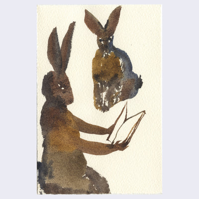 Scumble style watercolor painting on cream paper of a brown rabbit reading a book, with another brown rabbit sitting, positioned slightly in the background.