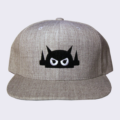 Grey hat with a flat bill and a black embroidered graphic of a Big Boss Robot head on the front center.