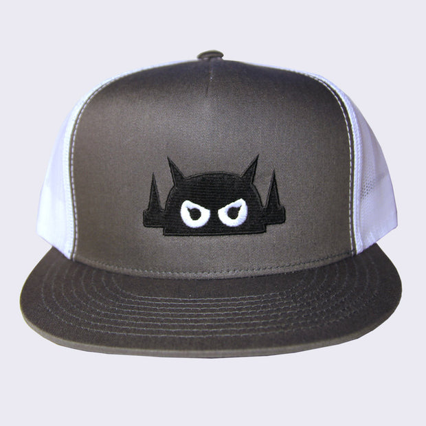 Front view of gray baseball cap. Robot head is stitched on with black thread. Its eyes are stitched in white thread but with black pupils.