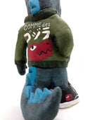 Close up detail of painted clay Godzilla sculpture.