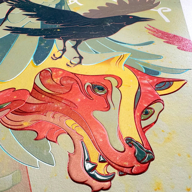 Detail of James Jean "Raven" print, a bright orange and yellow faced wolf with shiny eyes, teeth and nose looks up. Splatters of yellow decorate the print and certain lines are metallic and raised by embossing.