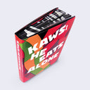 Overhead view of book, displaying the stack of pages with a black and white pattern design.