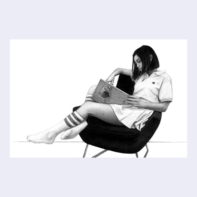 Finely rendered graphite drawing of a woman in a white short sleeve polo shirt and a white pleated skirt, sitting sideways on a black lounge chair. She reads "Lolita"